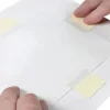Lineco archival see thru strips 1585 action shot 1 Lineco See Thru Archival Mounting Strips 100mm - 60 Pack