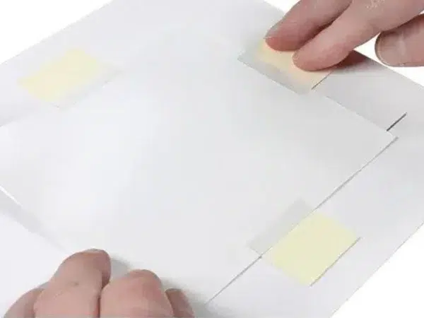 Lineco archival see thru strips 1585 action shot 1 Lineco See Thru Archival Mounting Strips 100mm - 60 Pack