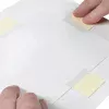 Lineco archival see thru strips 1585 action shot 1 Lineco See Thru Archival Mounting Strips 100mm - 60 Pack